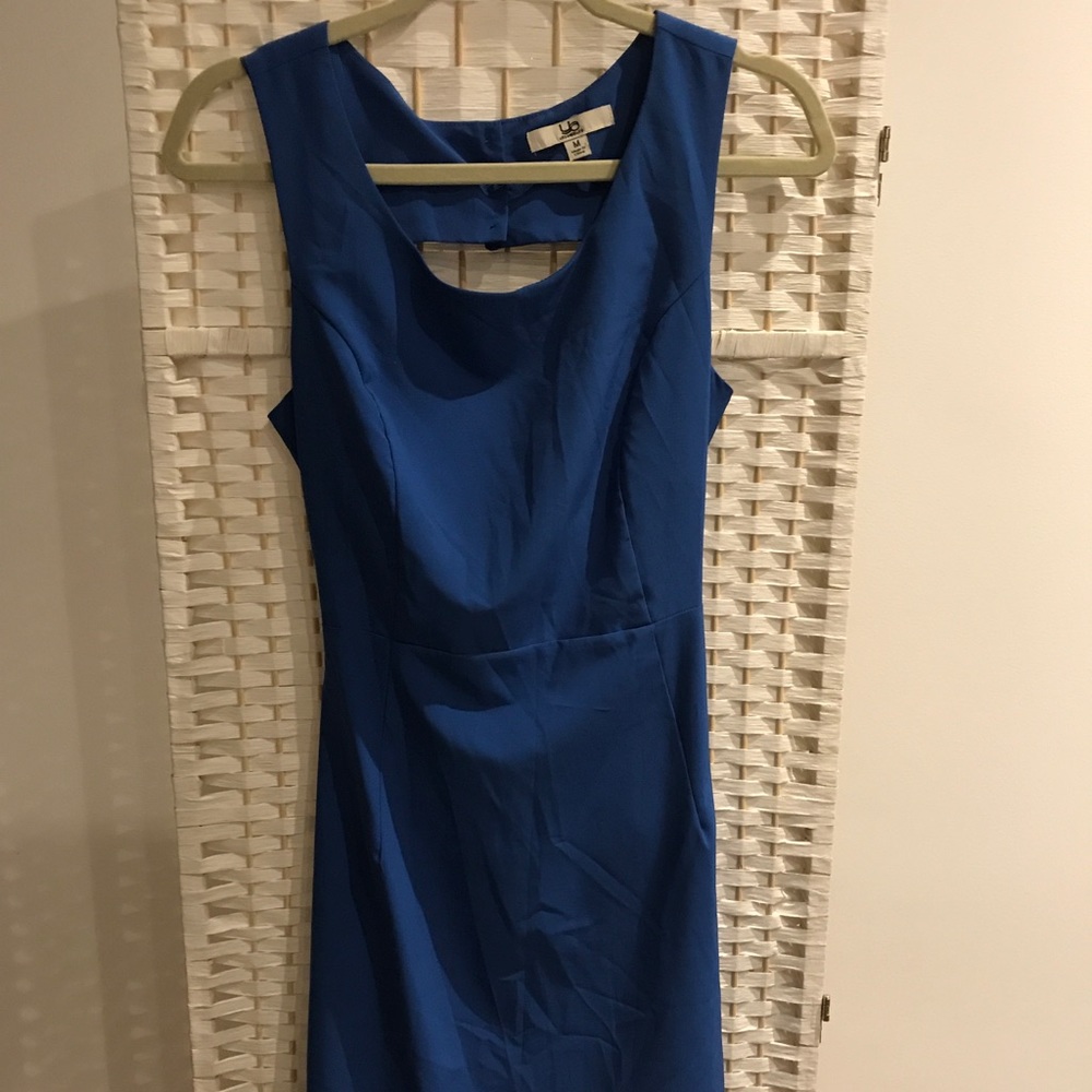 ALL OFFERS ACCEPTED!  Ya blue cutout sleeveless dress size medium
